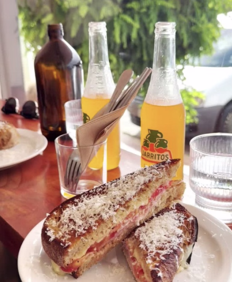 Two Jarritos sodas and a cheese dusted toastie from Communion Cafe in Geeveston, Tasmania.